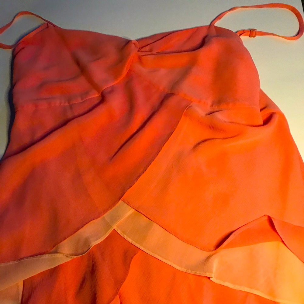 Women work the weekend long pink and orange blouse